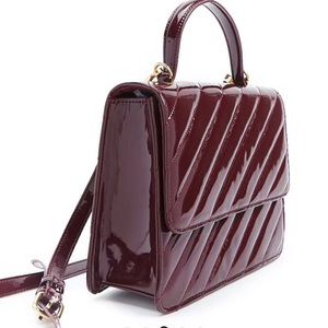 Anew Burgundy quilted faux patent leather satchel